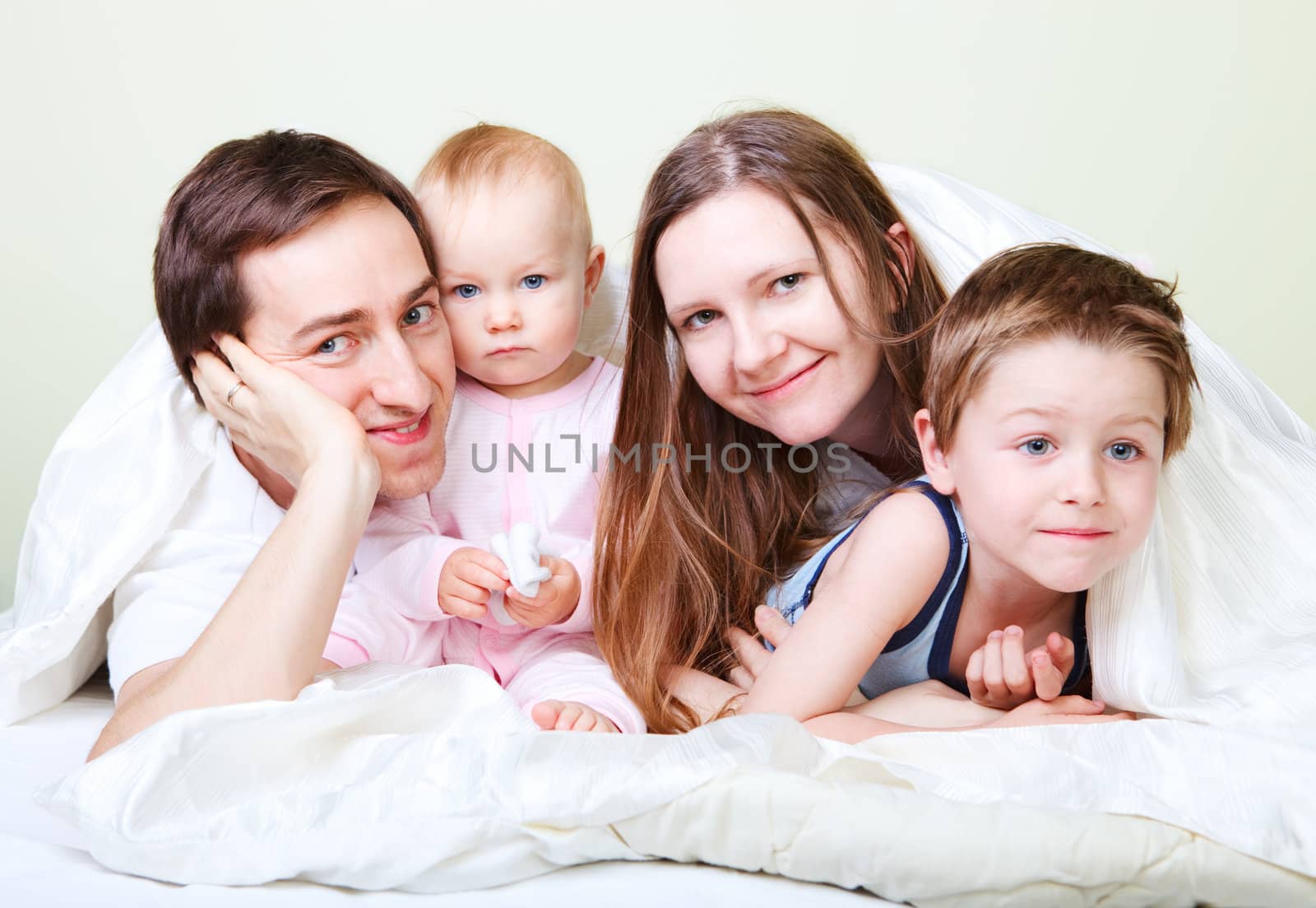 Family in bedroom by shalamov