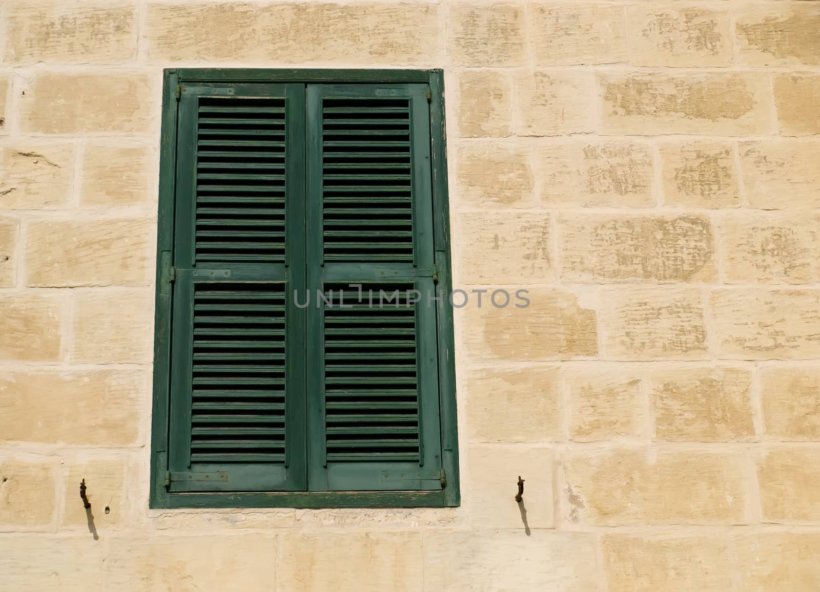 A medieval window in traditional baroque style in Mdina on the island of Malta