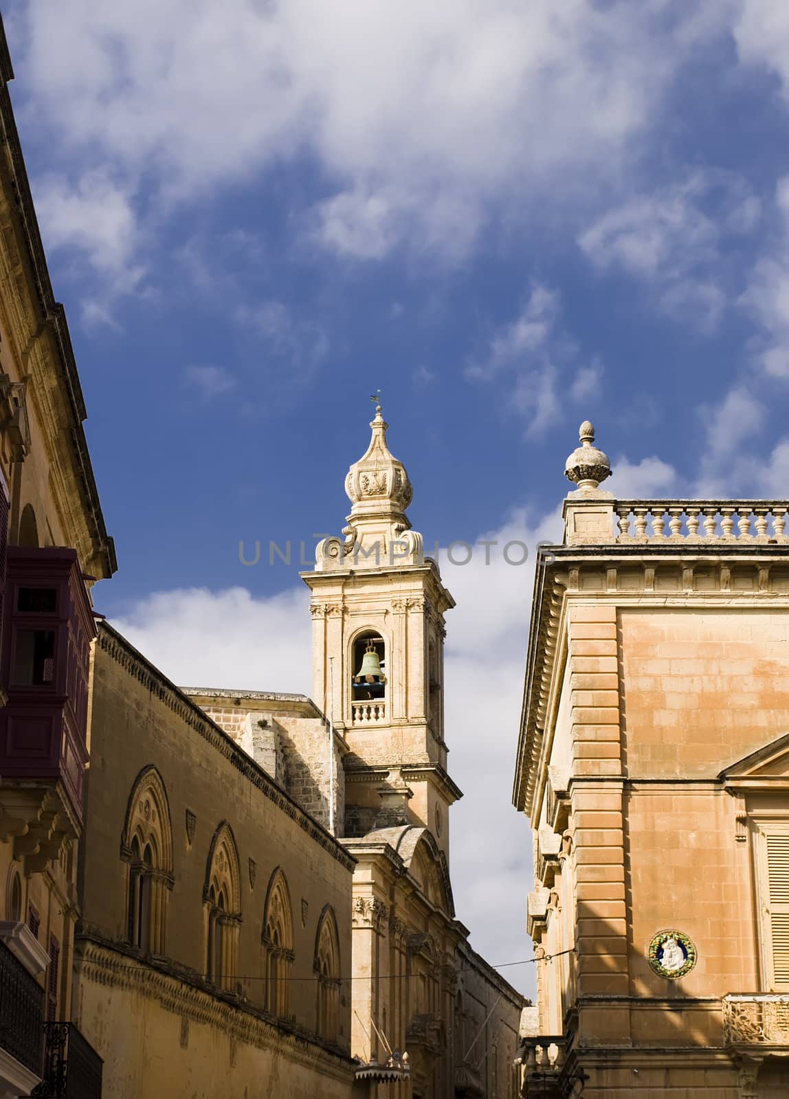 A medieval limestone church steeple in Mdina on the island of Malta