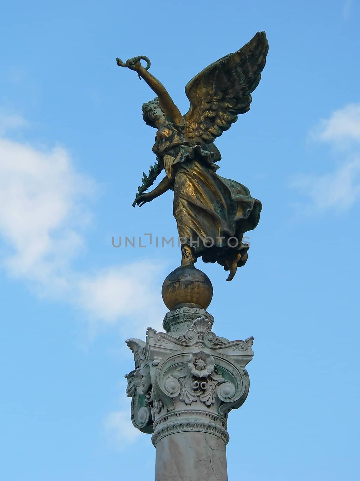 angel statue in rome and blu sky