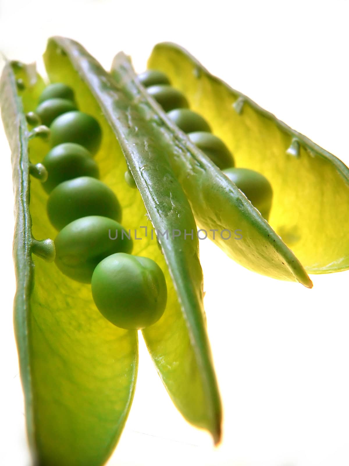 peas on white background close up