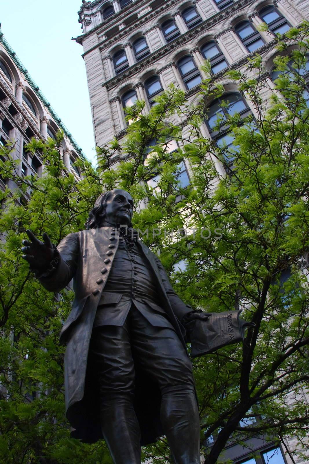 Statue of Benjamin Franklin in outdoor settings. Shot in New York City.