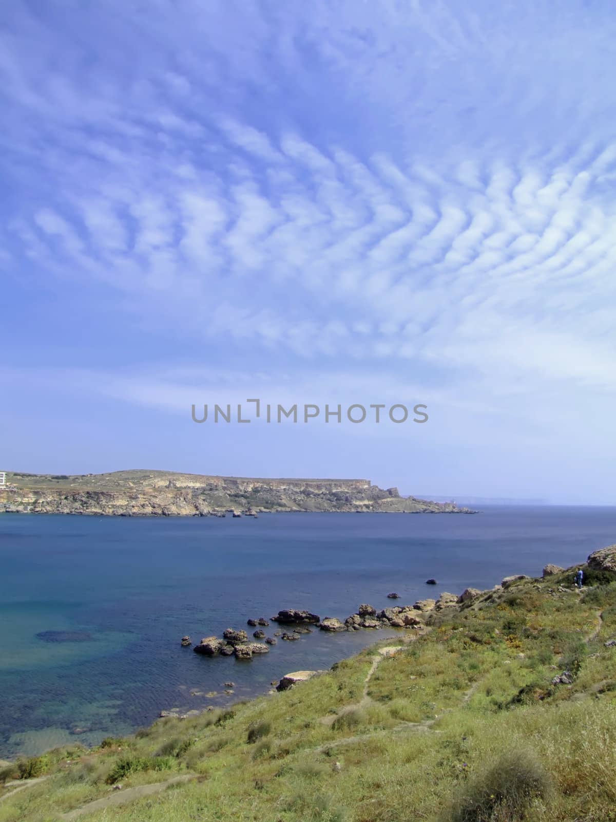 Typical rocky coastline in Malta, punctuated with sheer drops and jagged cliffs