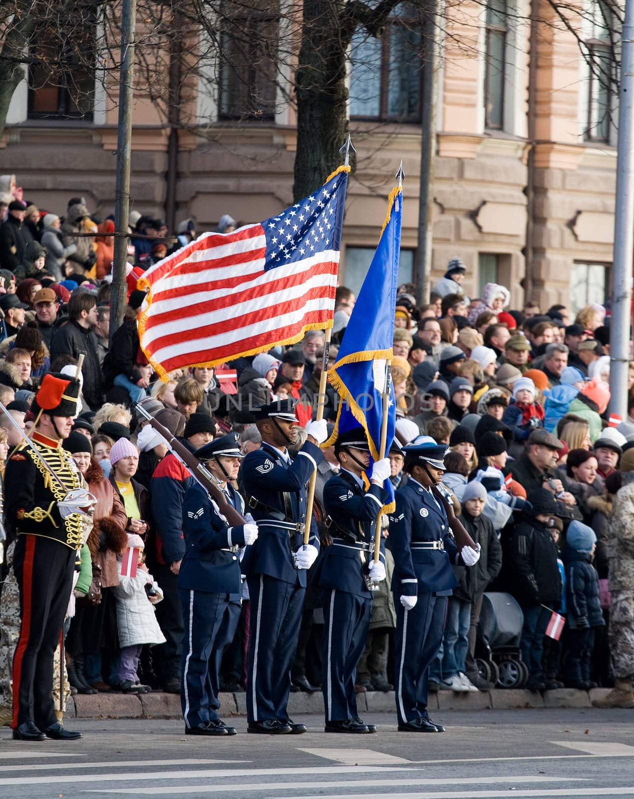 LATVIA - NOVEMBER 18: USA Color Guard at Military parade of the National Armed Forces. 90th anniversary of establishment of the Republic of Latvia. Riga November 18, 2008.