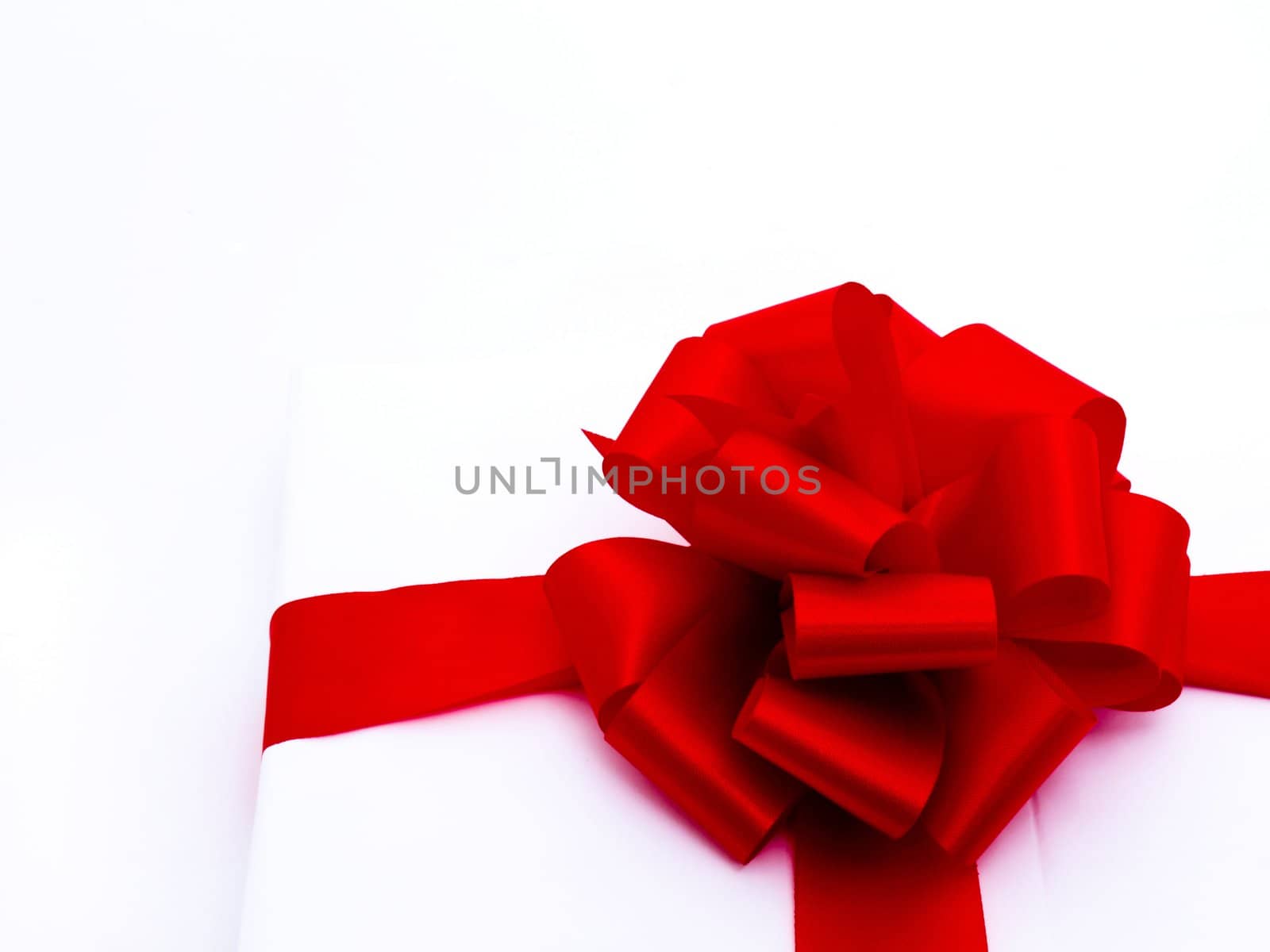  Generic Gift with Red ribbon on white background