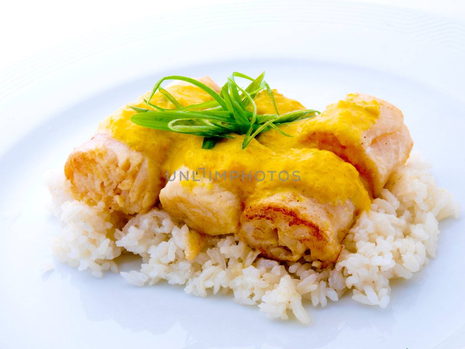  Rolled fish with rice on white background