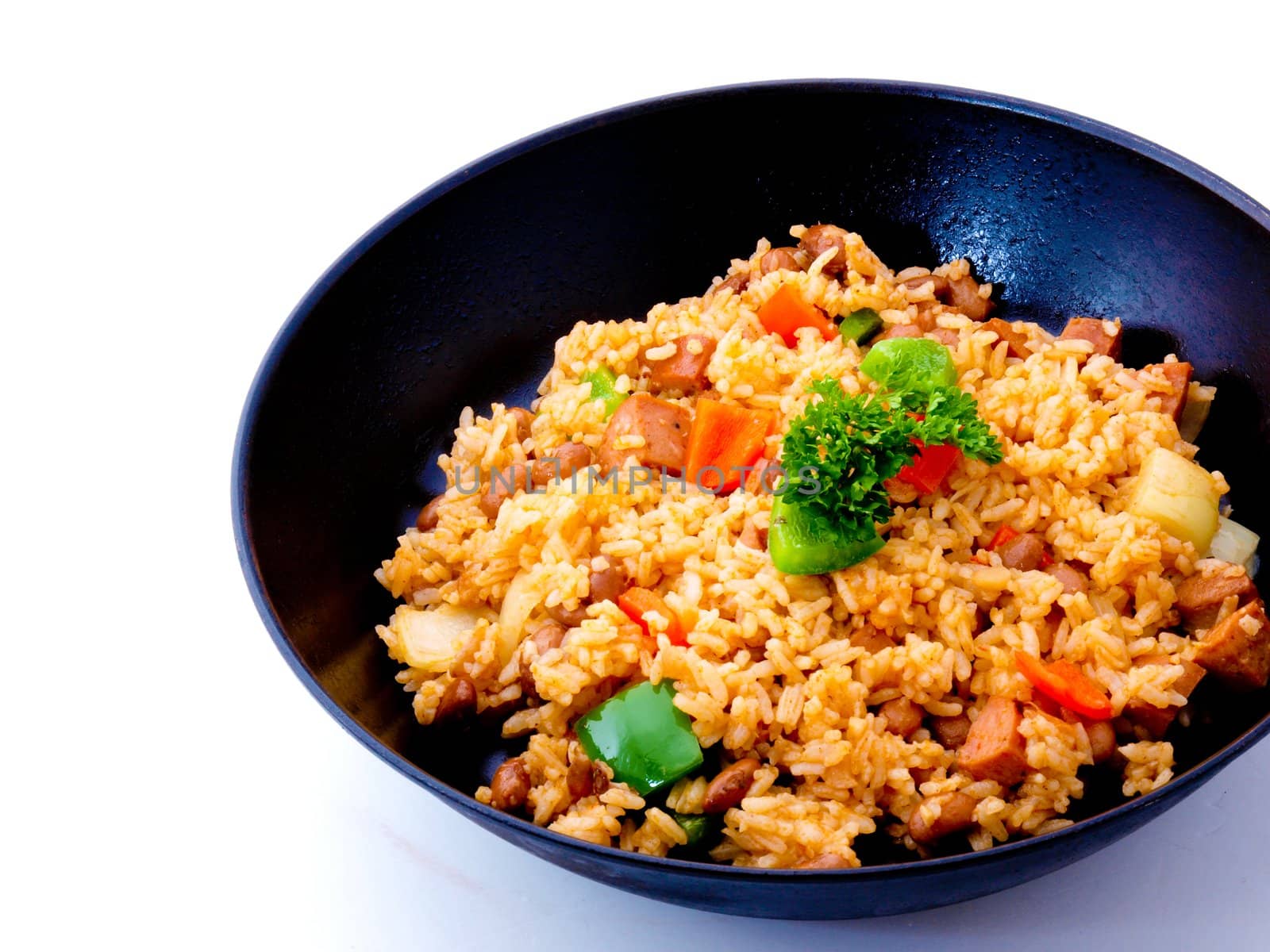  Asian Fried rice on black pan on white background