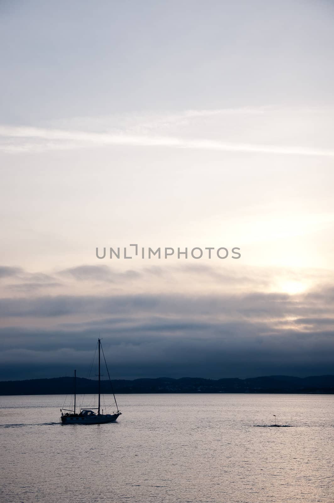 Sailboat in dark sunset  by ThomasOderud