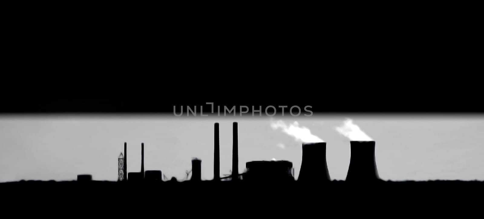 Alternative Green Energy Nuclear Power Plant silhouette with copy space.