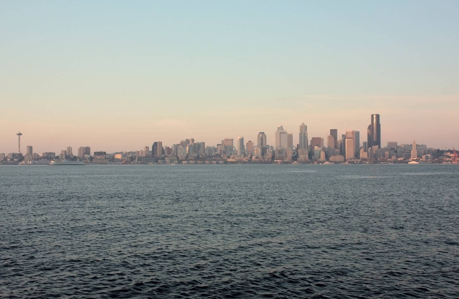Downtown Seattle Skyline with Space Needle captured from a vantage point across the waters of the Puget Sound.
