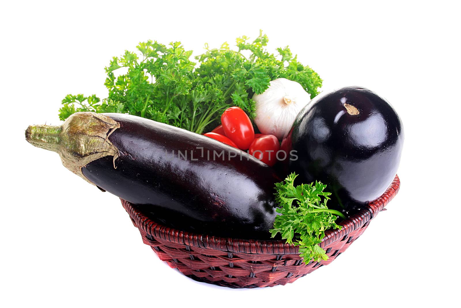 Eggplant with small tomatoes and fresh parsley.