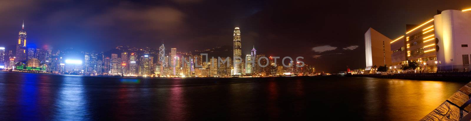 It is dramatical panoramic of Victoria harbor in Hong kong.