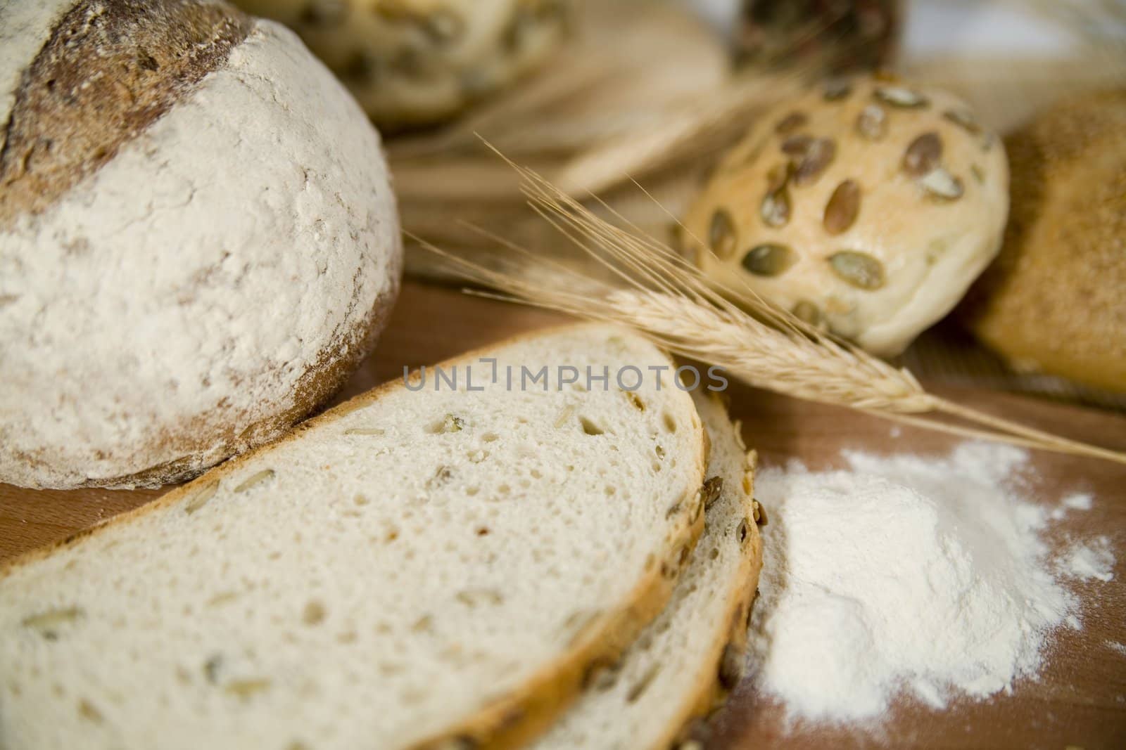 tasty and crispy fresh different kinds of bread with sour and wheat head