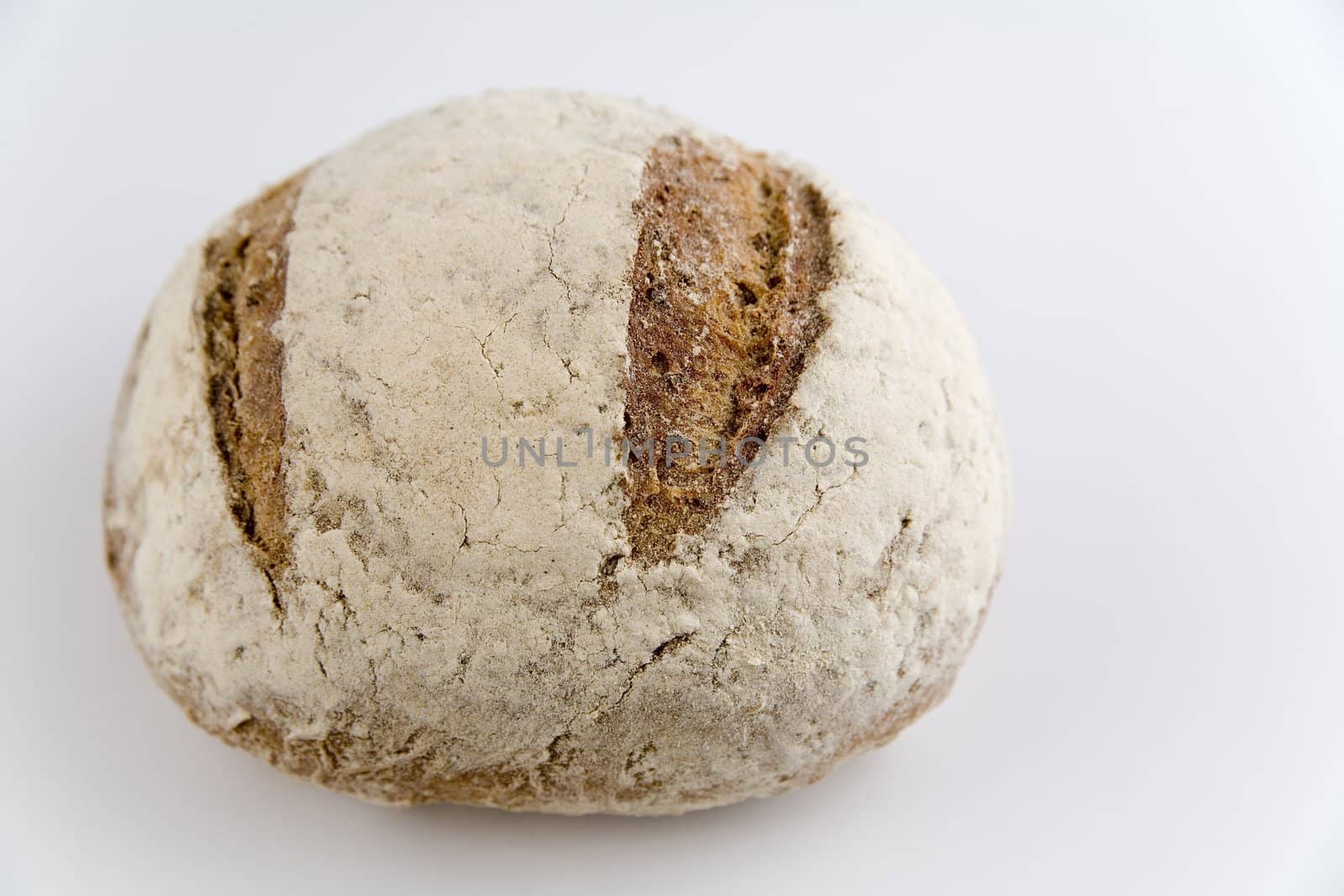 tasty and crispy fresh bread on white background