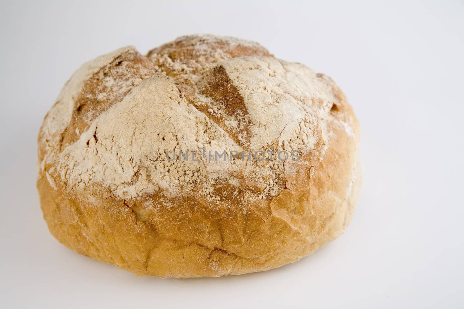 tasty and crispy fresh bread on white background