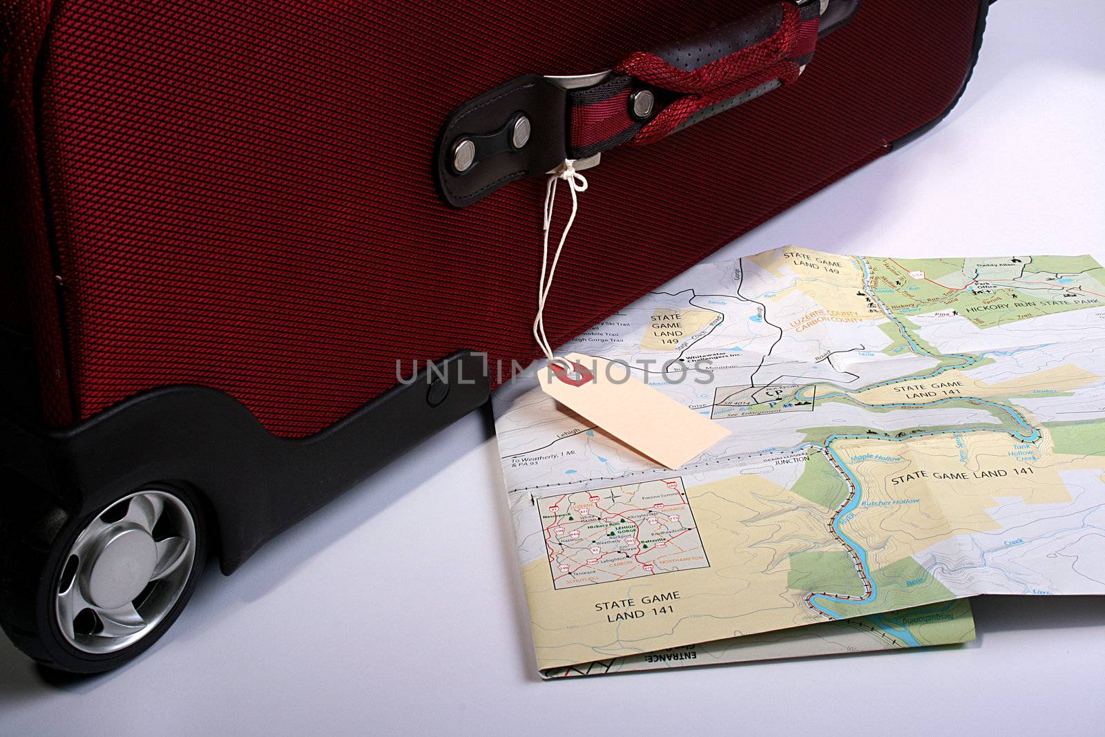 Red suitcase and map by VIPDesignUSA