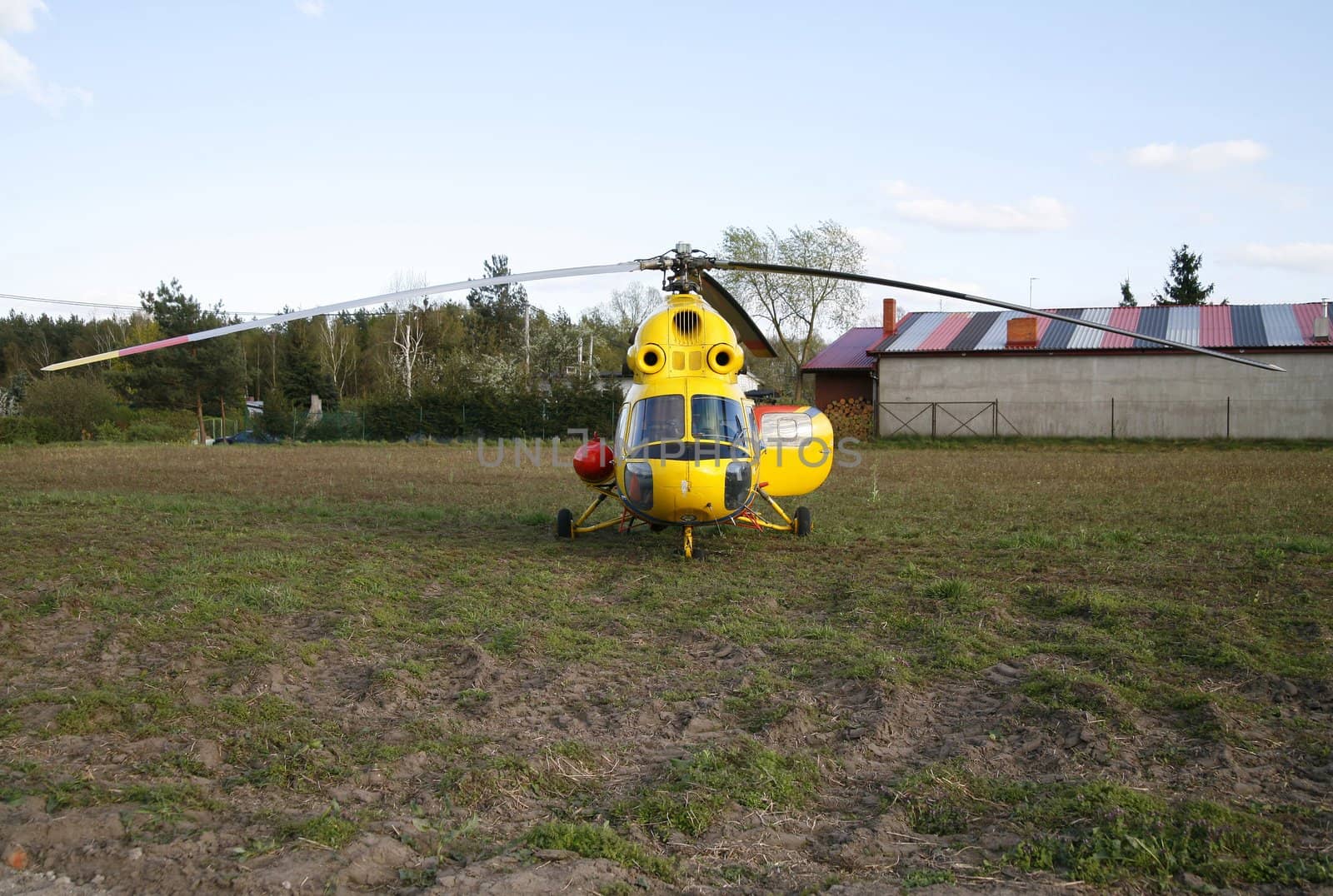 front of rescue helicopter landed on the grassy field