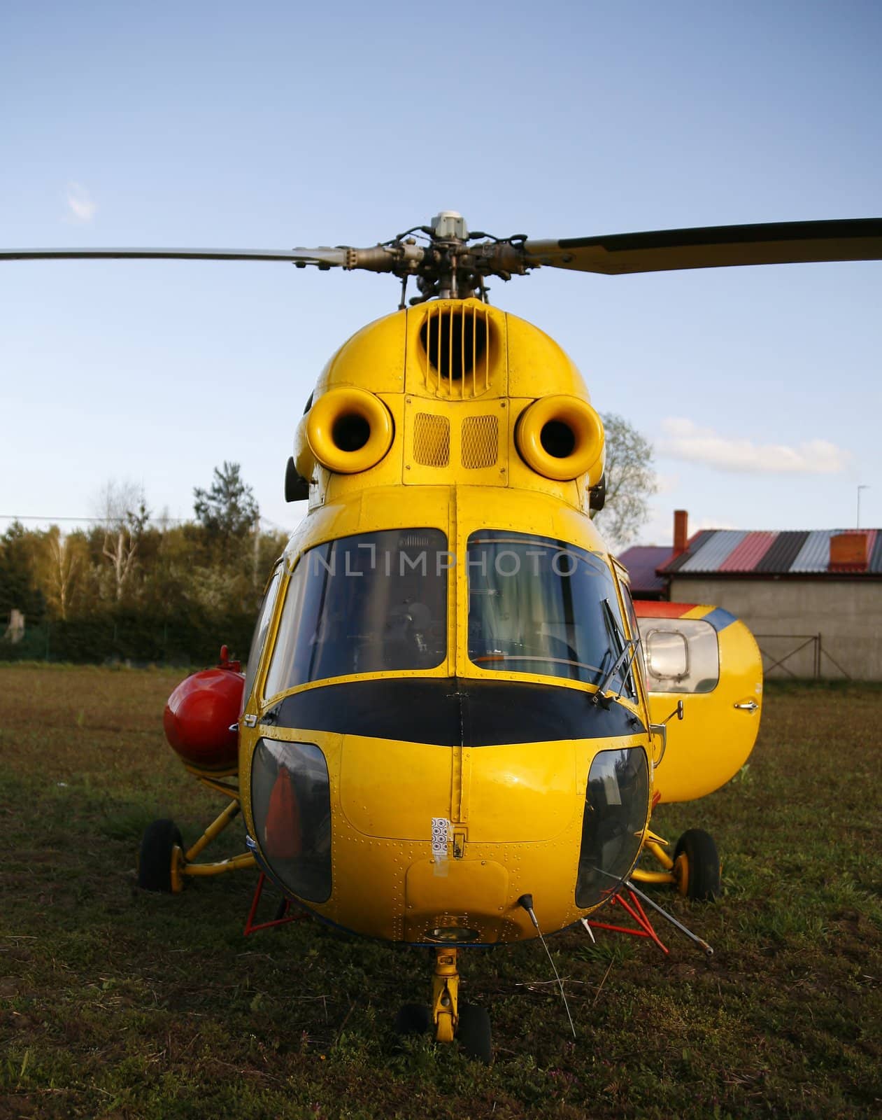 front of rescue helicopter landed on the grassy field