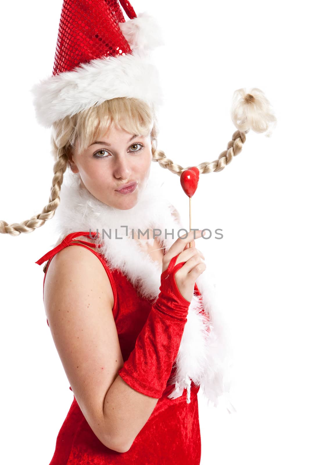 Cute young girl in christmas outfit on white background