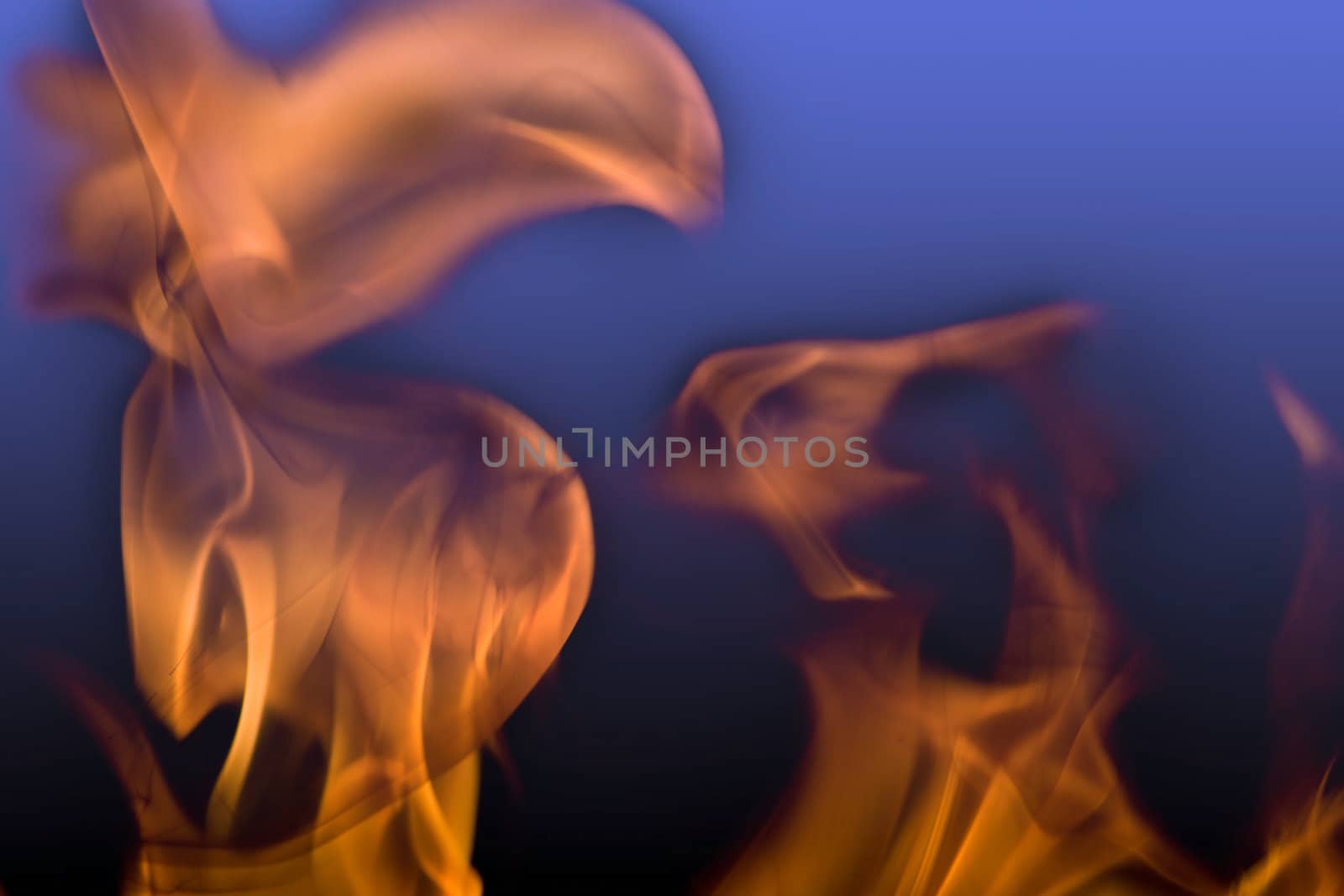 Flames of Fire Abstract on Blue Black Background 