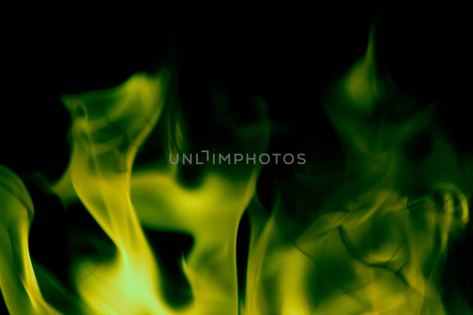 Green Flames of Fire Background against black.