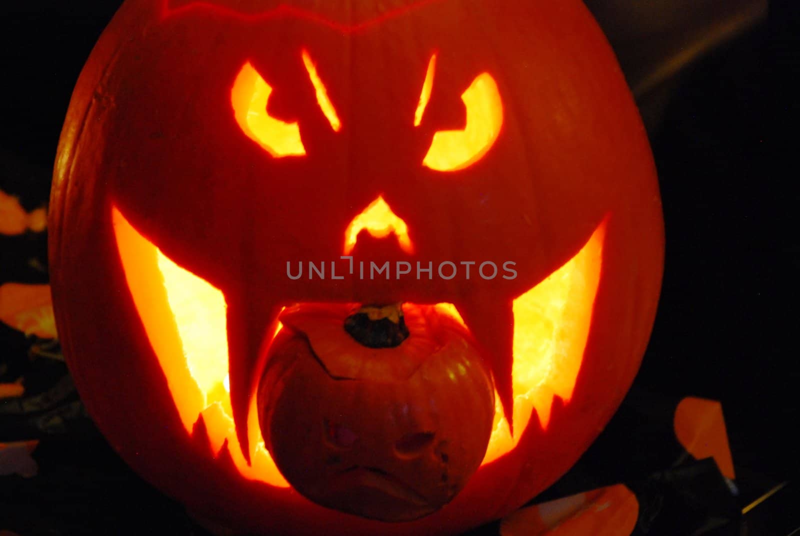 A close up for a carved pumpkin for Halloween