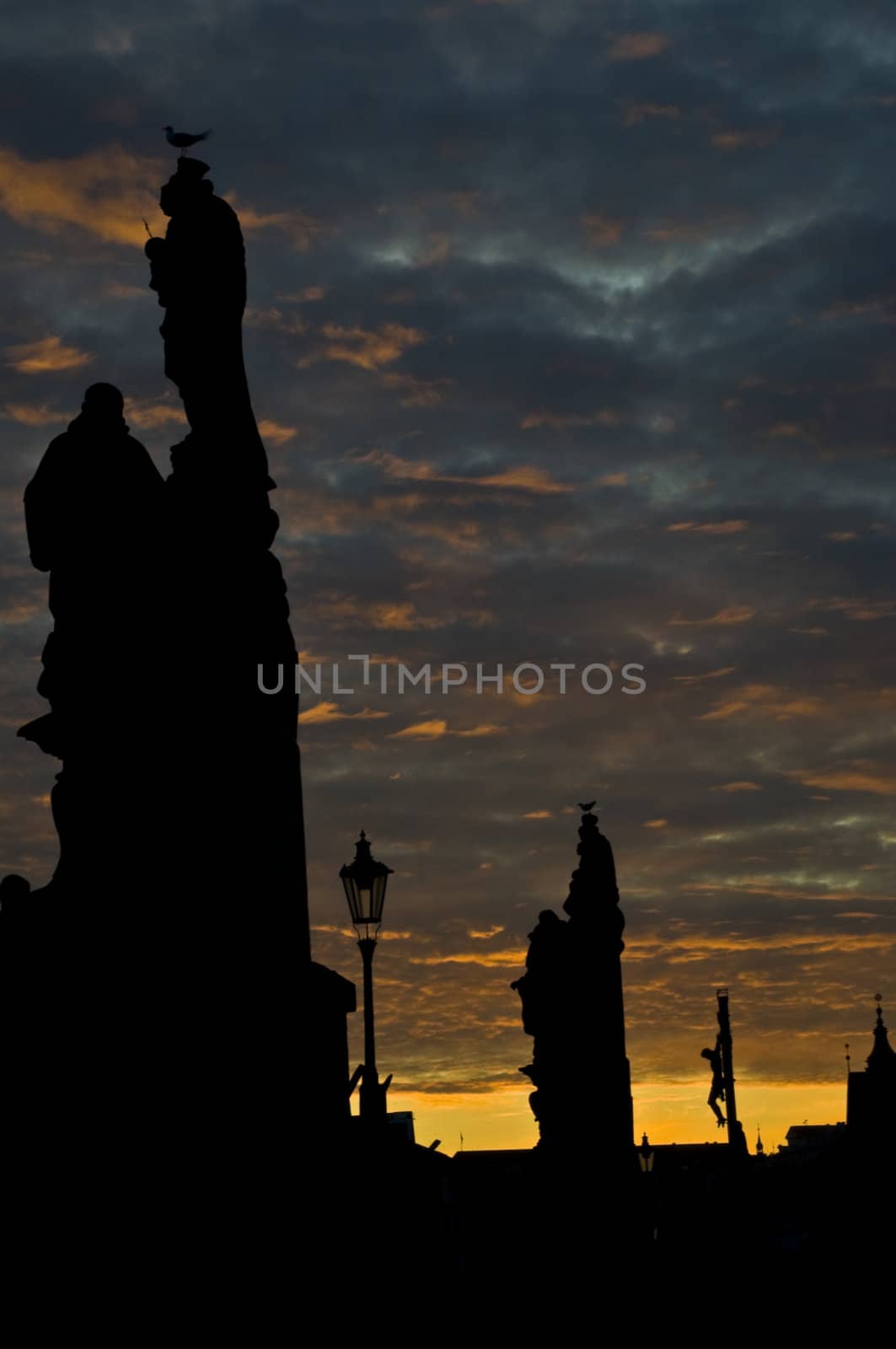 beautiful sunset at the Charles bridge in Prague