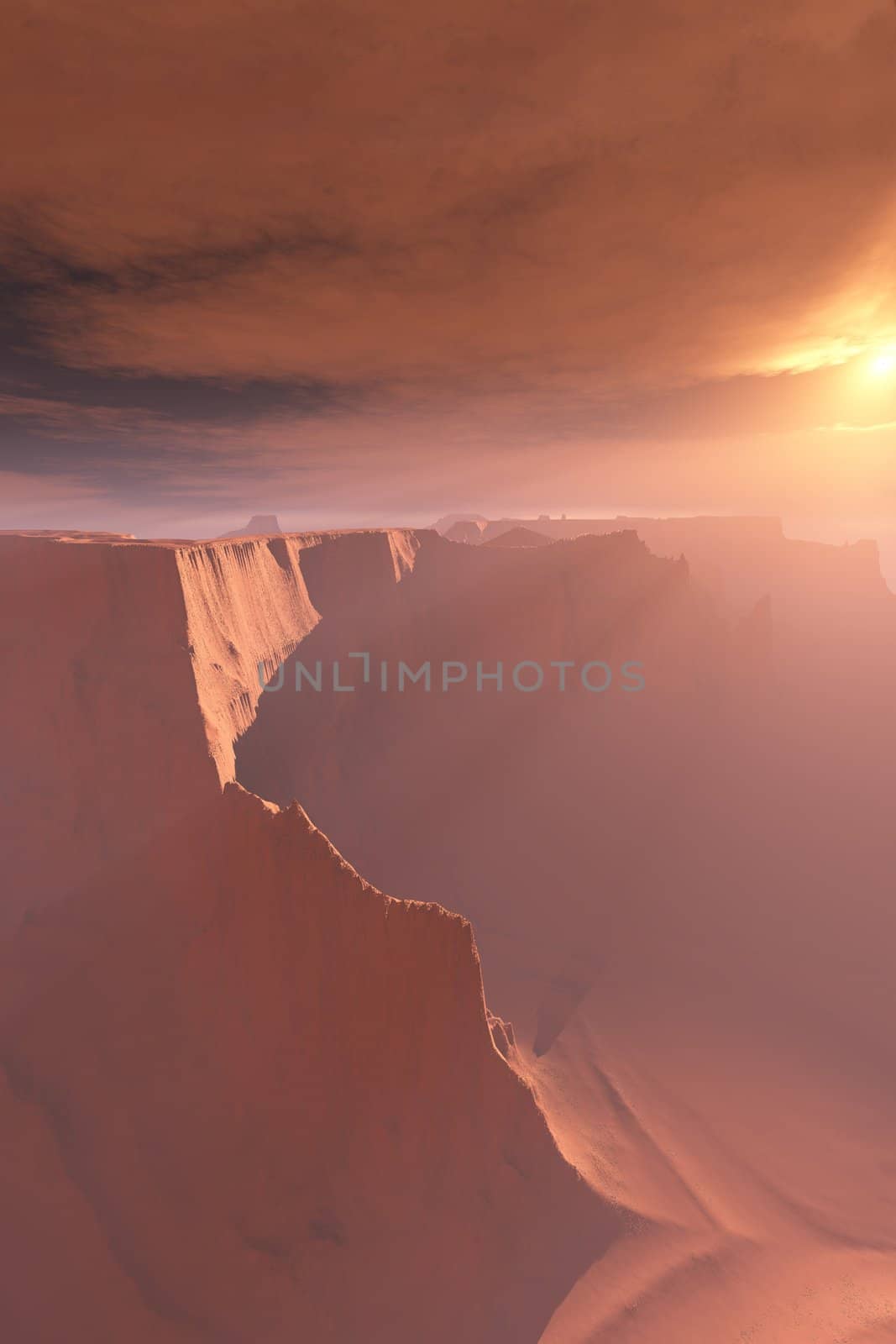 Sunrays shine down on this canyon landscape.