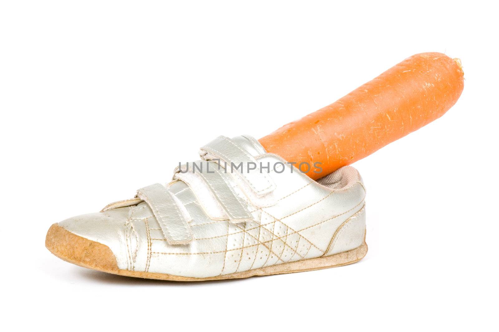 Shoe with carrot for the horse from Sinterklaas  on white

