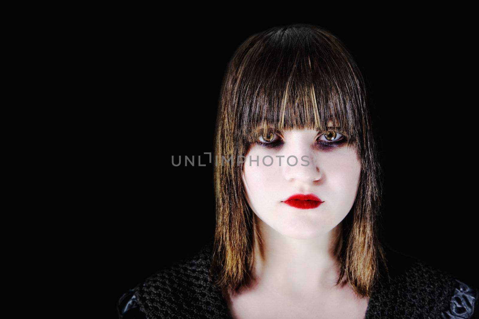 Closeup of Scary Young Girl with Dark Makeup