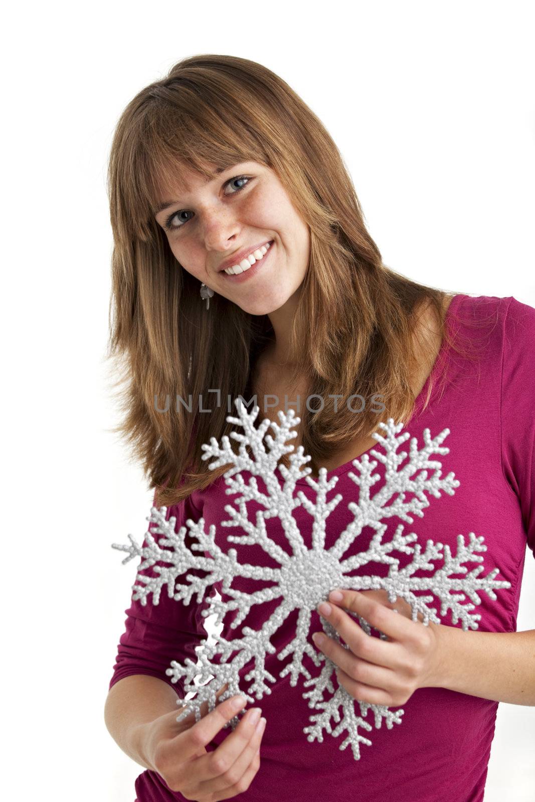 young woman holding a decorative snow flake