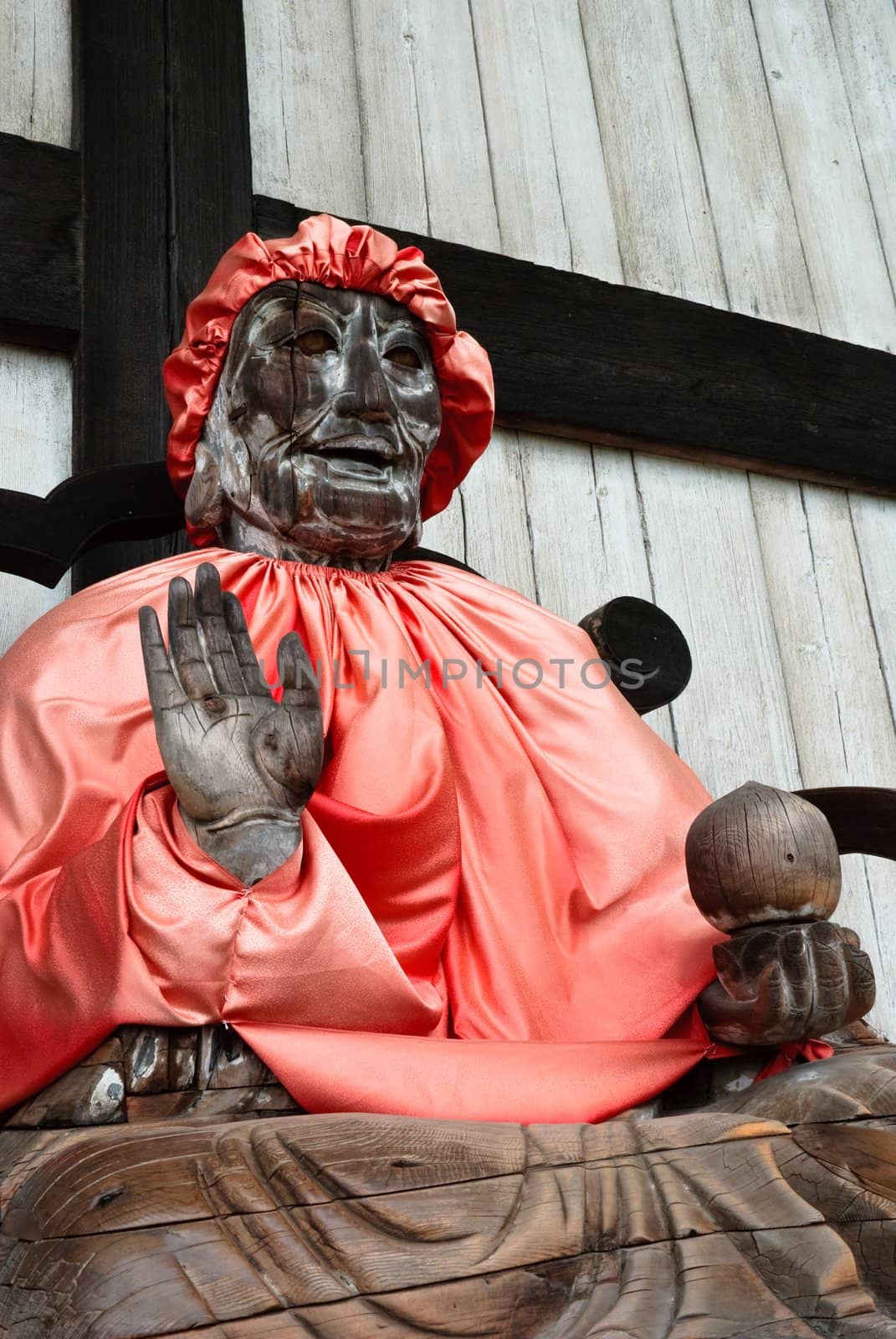 Binzuru (Pindola): wooden statue of Buddha at the entrance of Todai-ji temple in Nara, Japan.