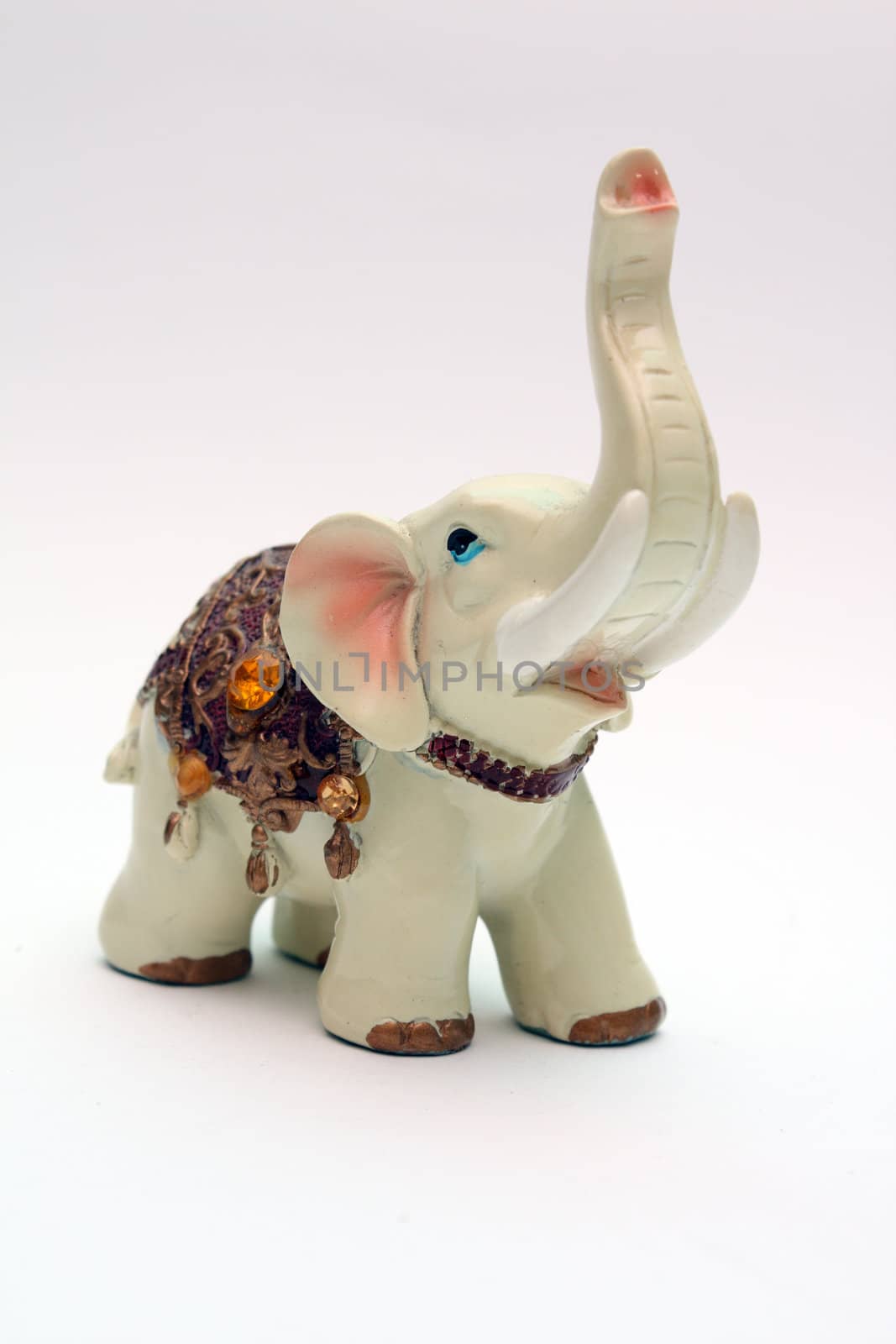 Old toy. Porcelain elephant. Symbol of good luck and Wealth