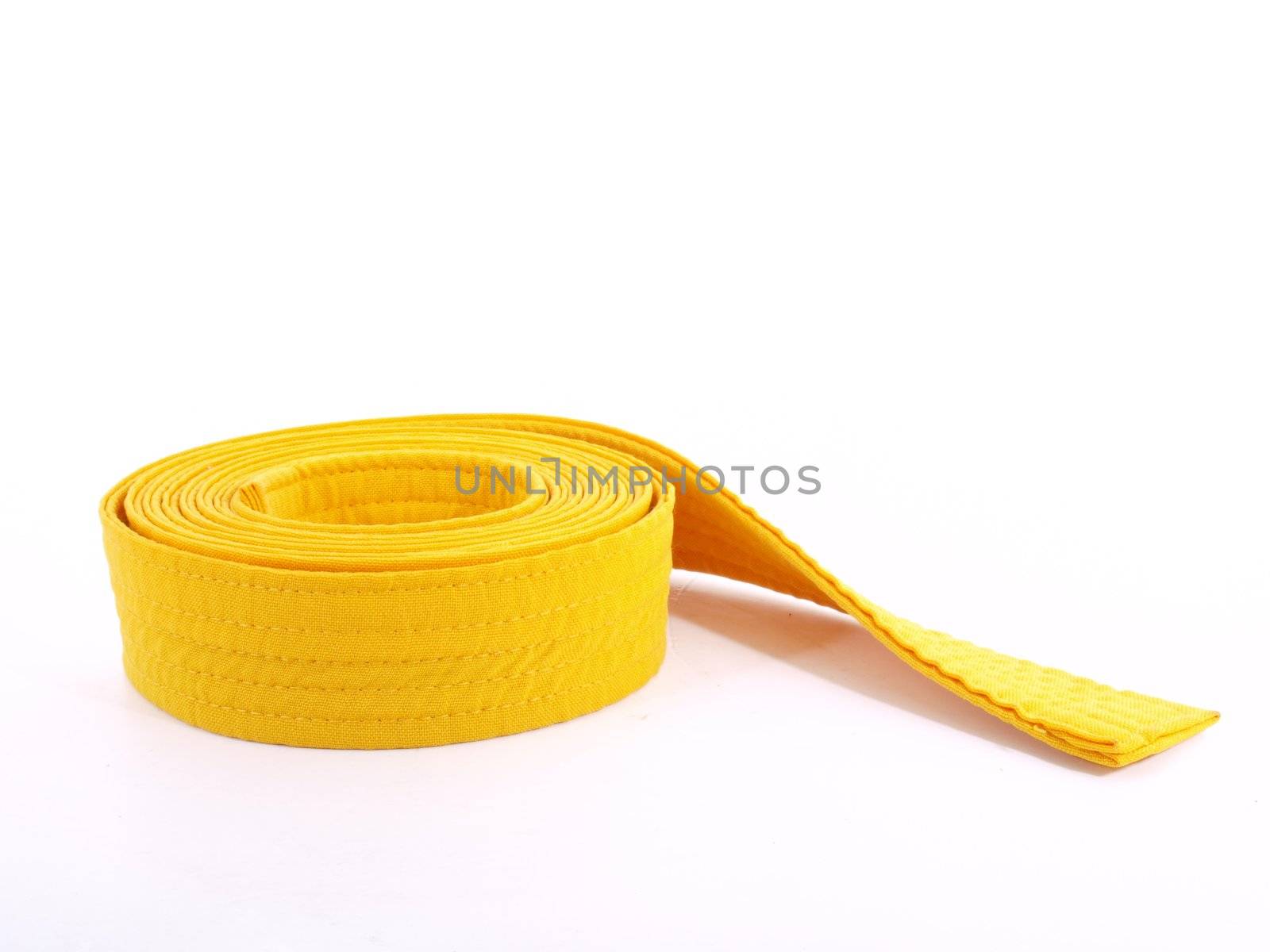 Yellow Cloth belt rolled on white background