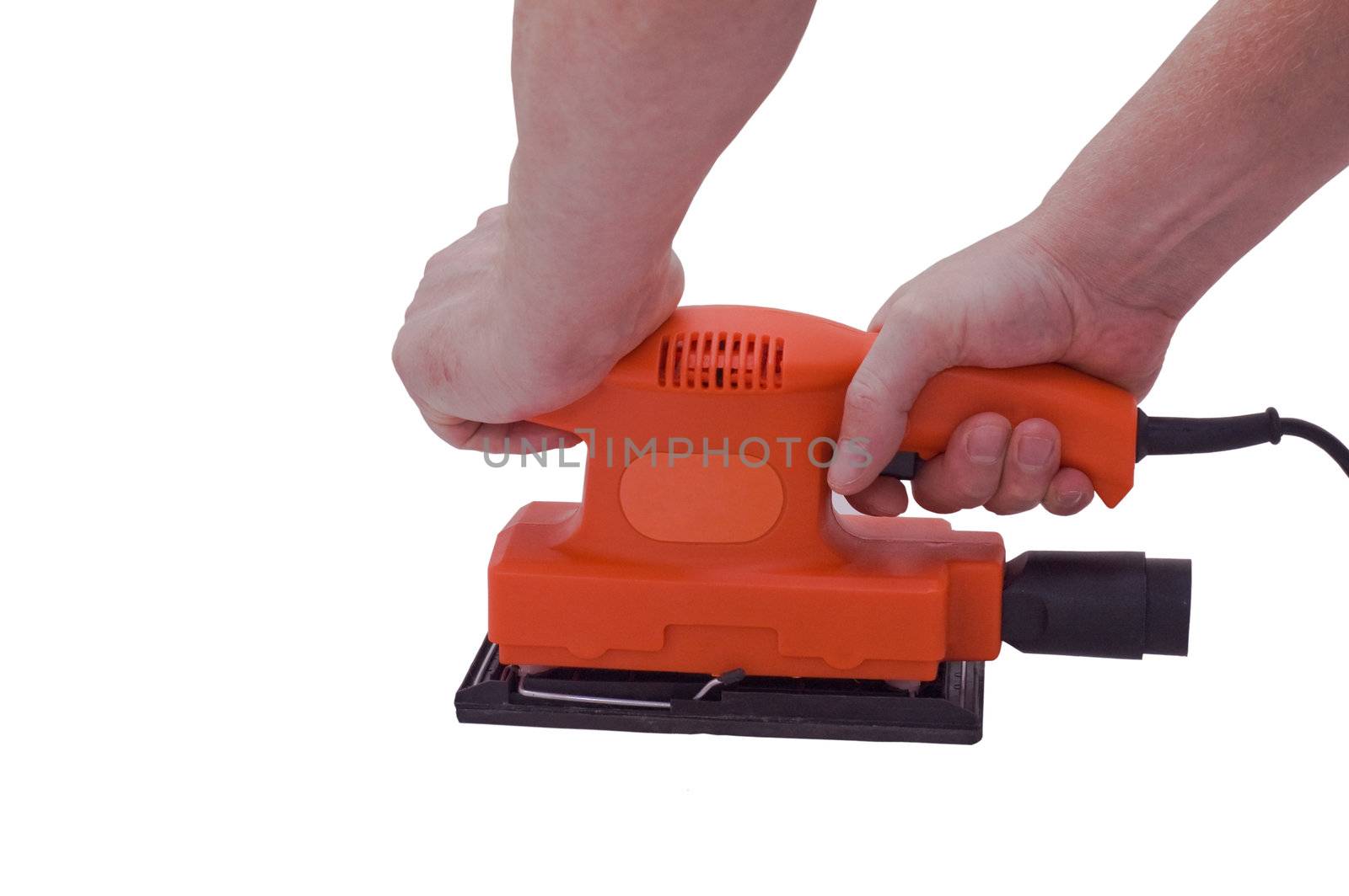 an isolated over white image of a Orange orbitol sander being held by two caucasian male hands.