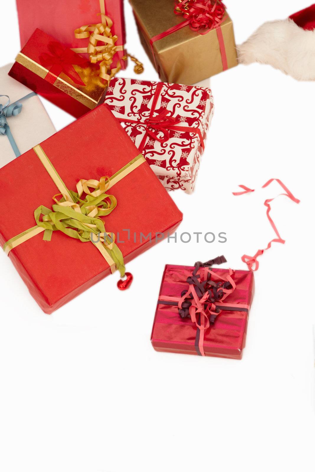 Christmas presents - On white background by FreedomImage