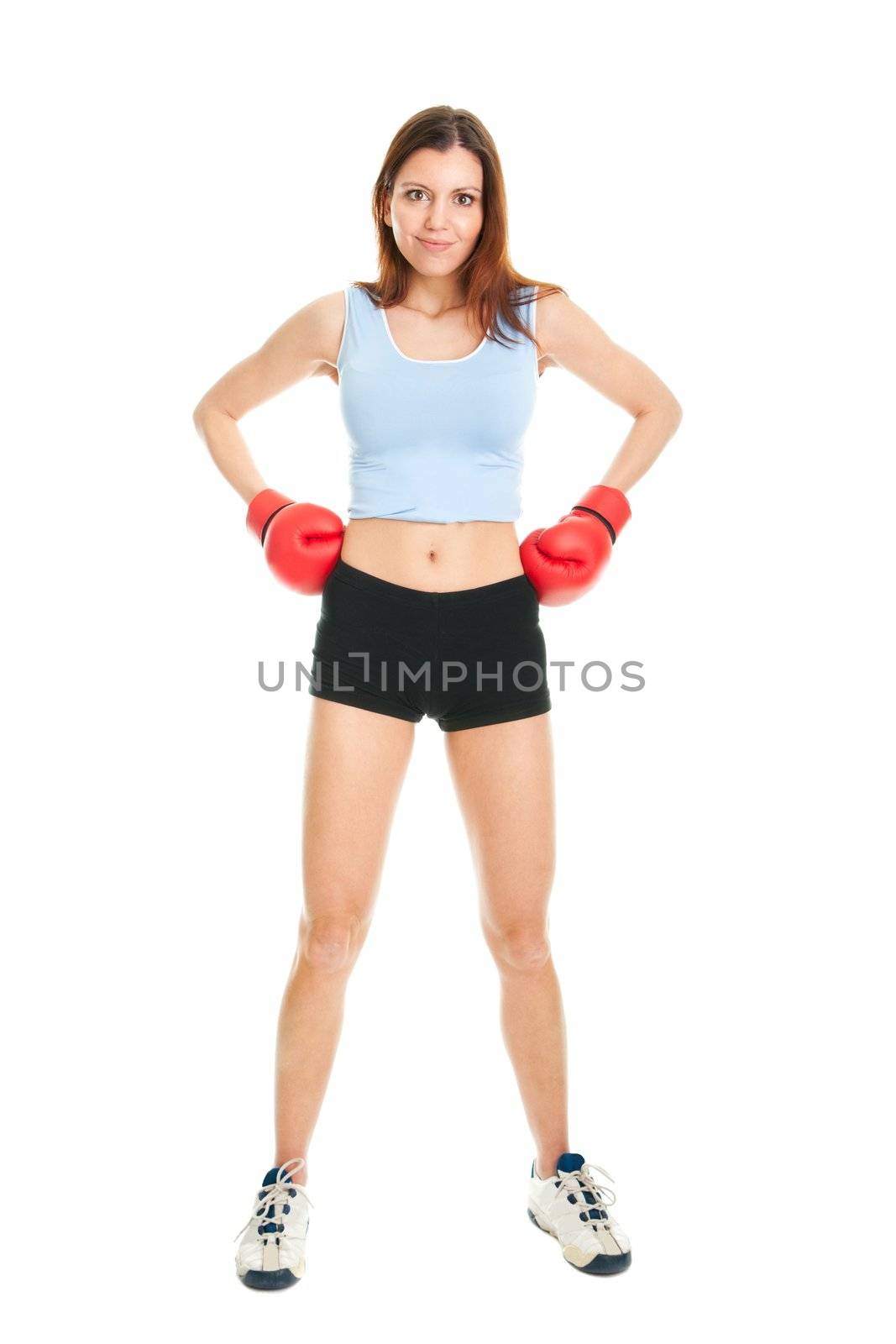 Beautiful woman practicing boxing. Ready to fight. Isolated on white