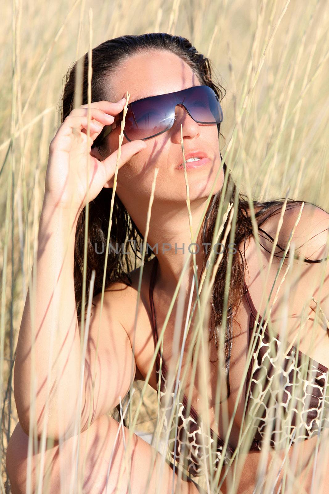 Young woman near of beach in the sea