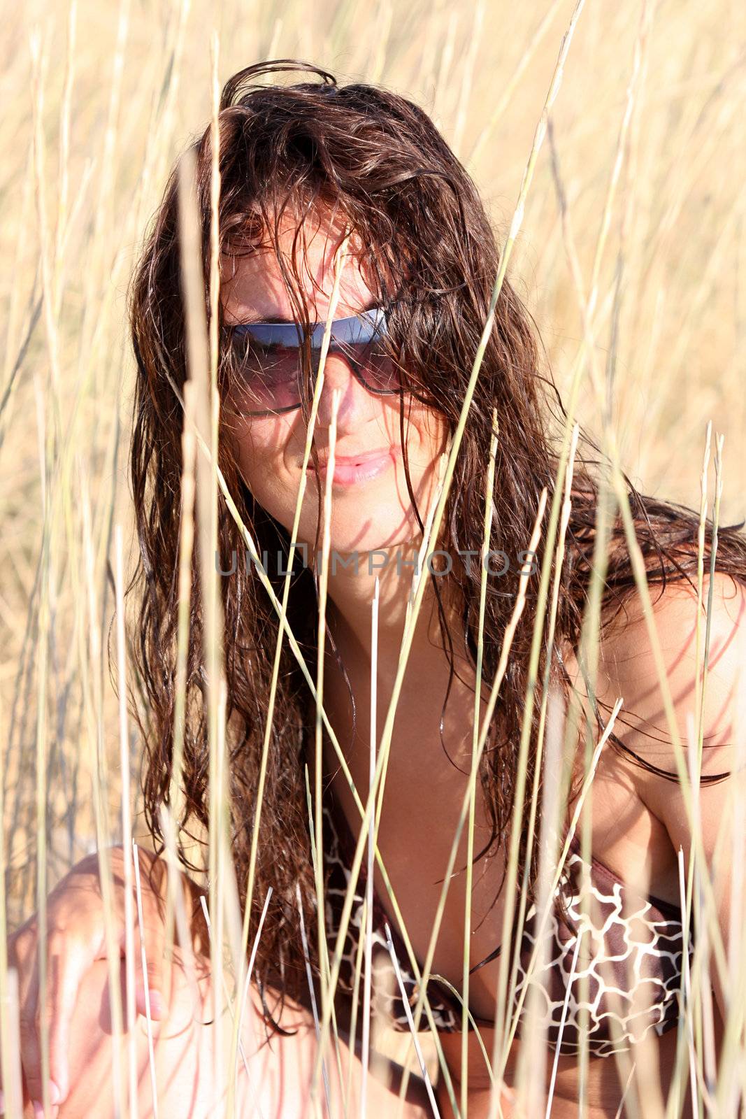 Young woman near of beach in the sea