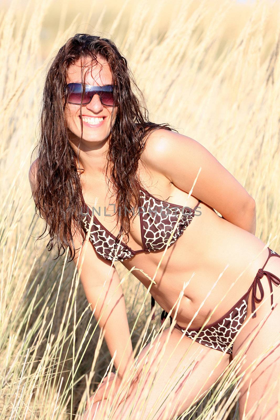 Young woman near of beach in the sea