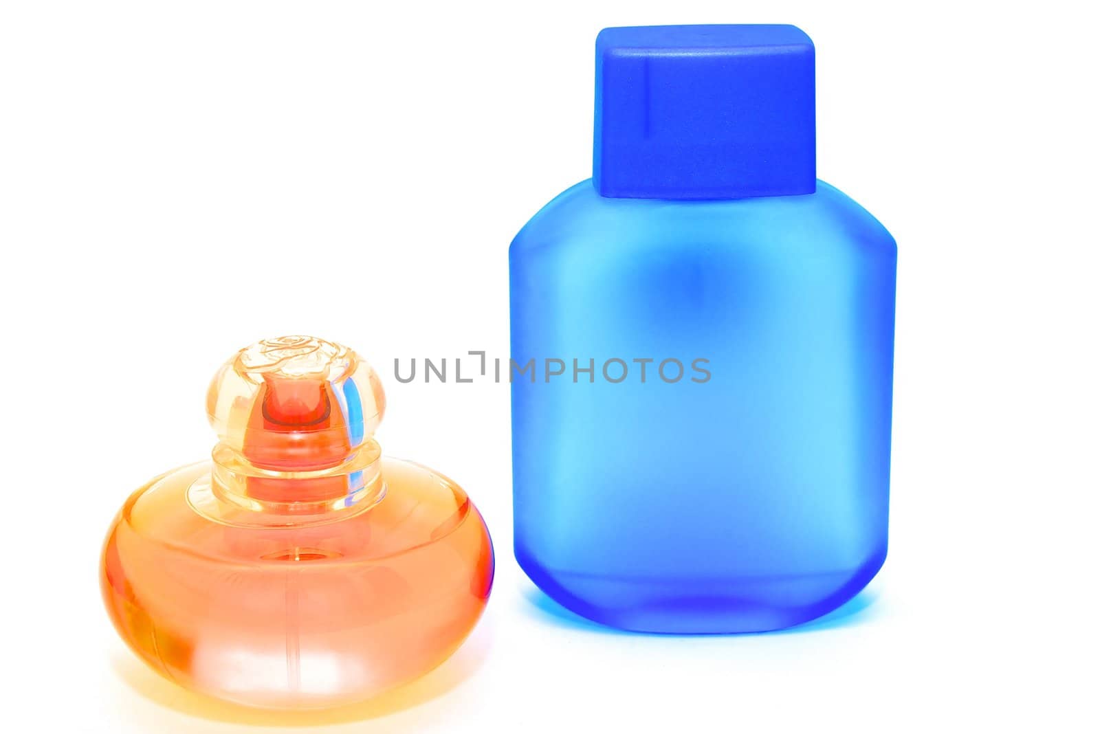 two bottles of perfume on white background