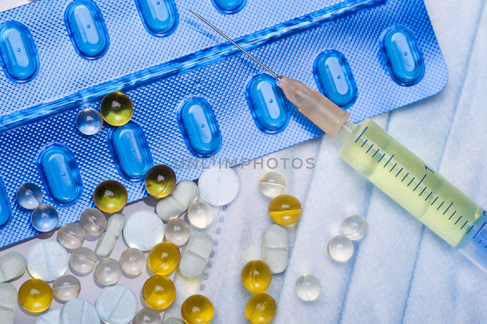 pharmaceutical products and medical mask on white background