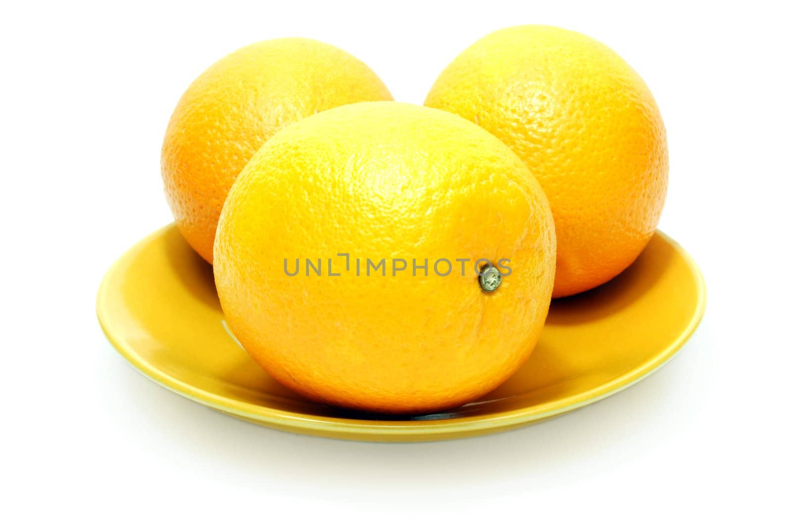 Three Isolated Oranges on White Background