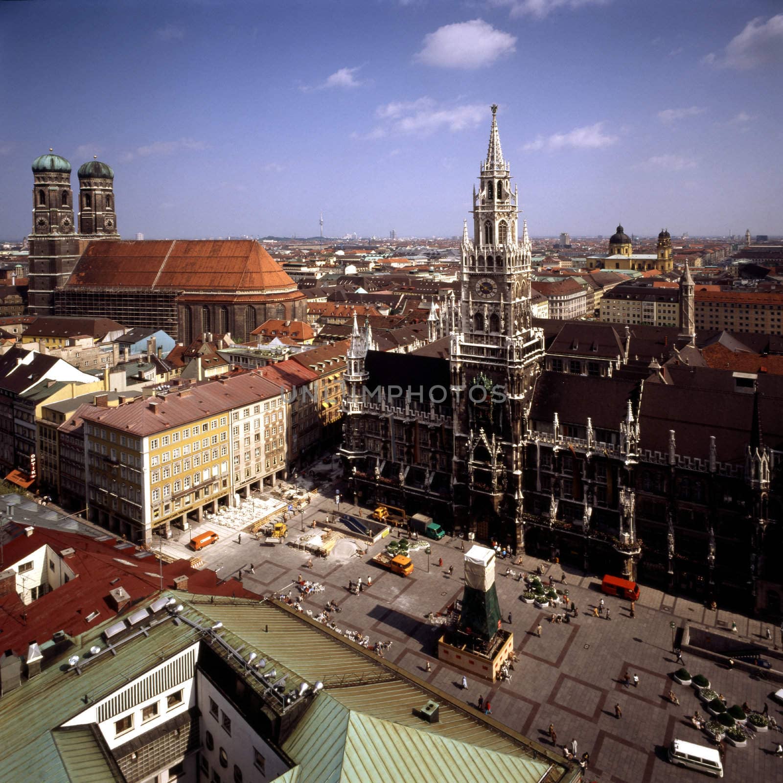 Marienplatz with a Clockspiel on Town Hall Tower and Frauenkirche