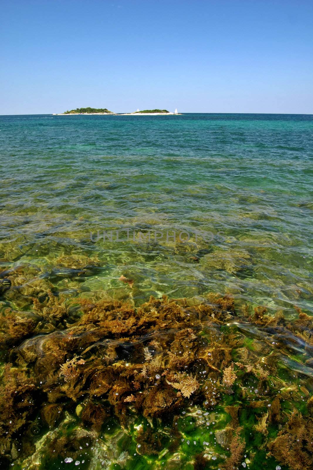 Turquise sea with two islands