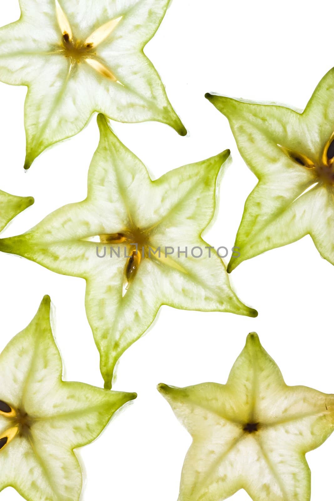 fruit background:  sliced carambola on the white