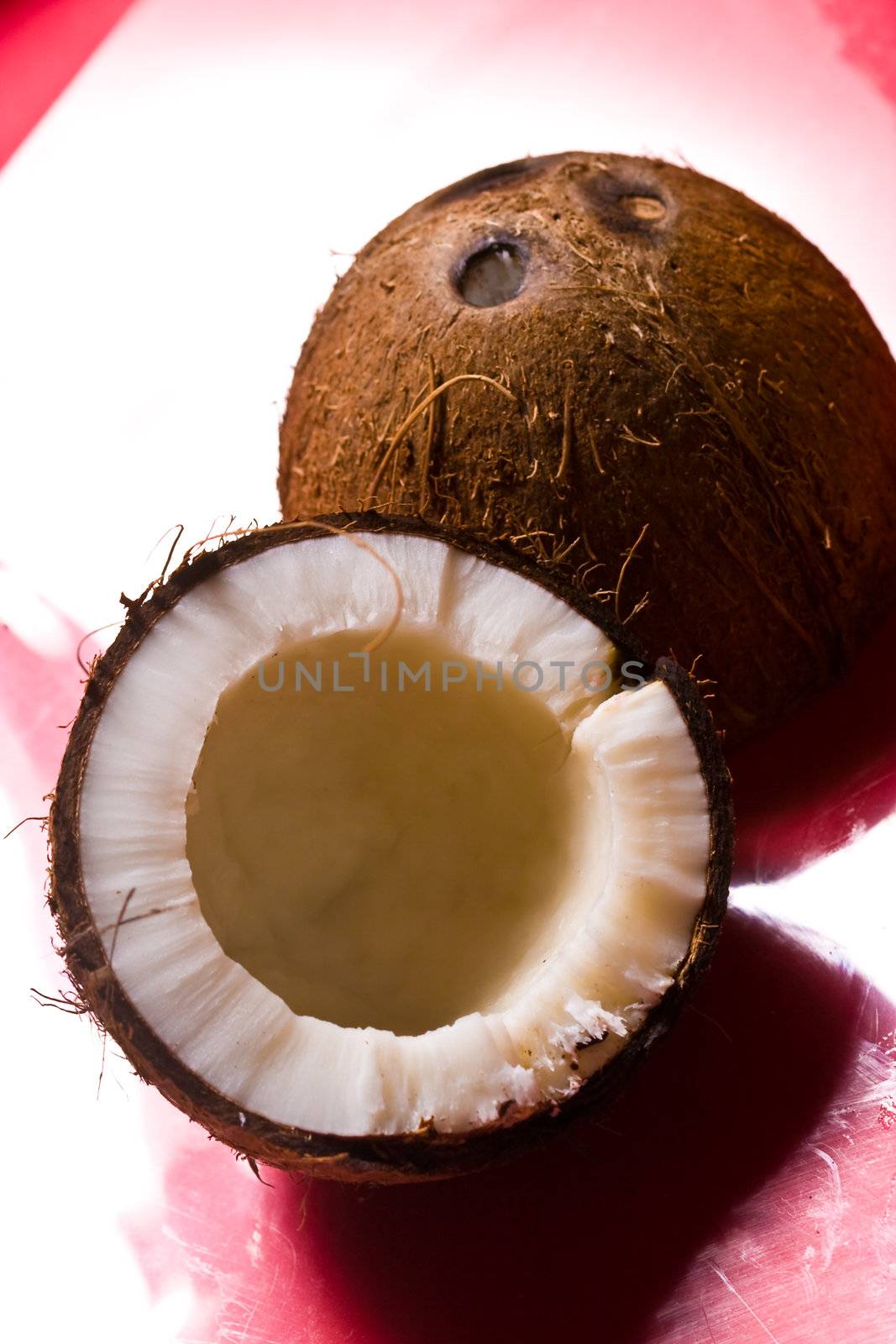 exotic fruit series: whole and broken coconut