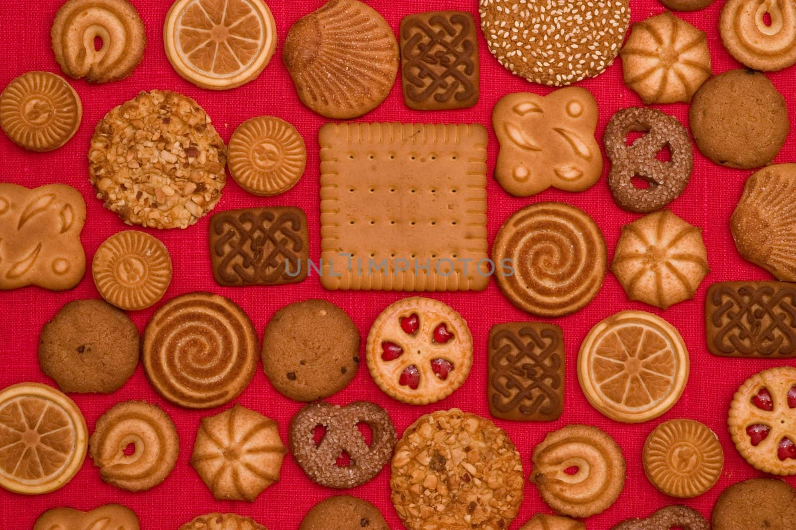 sweet background: different pastry on the red