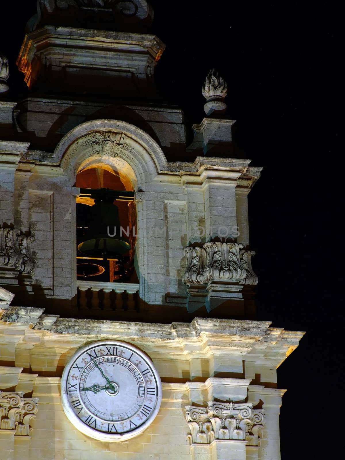 Detail of intricate medieval baroque architecture - detail of stonework on Mdina cathedral belfry in Malta