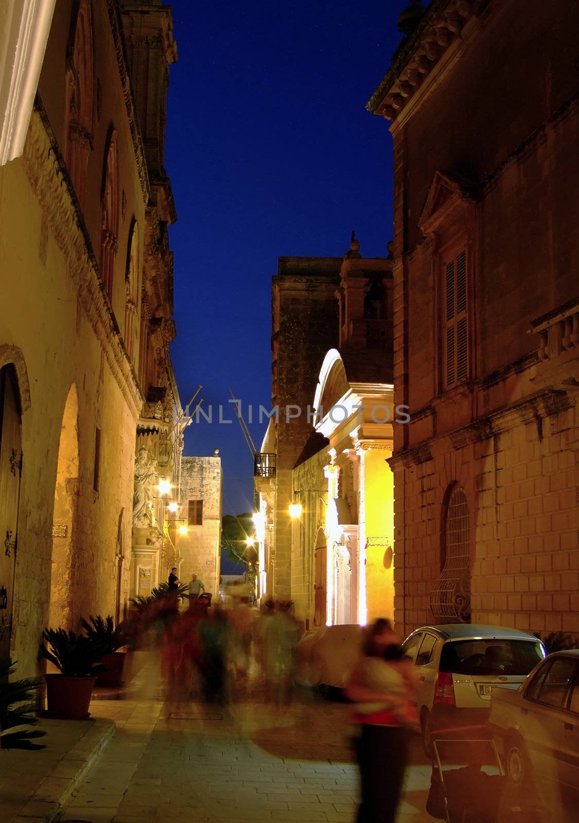 Medieval street by night, in the old city of Mdina in Malta
